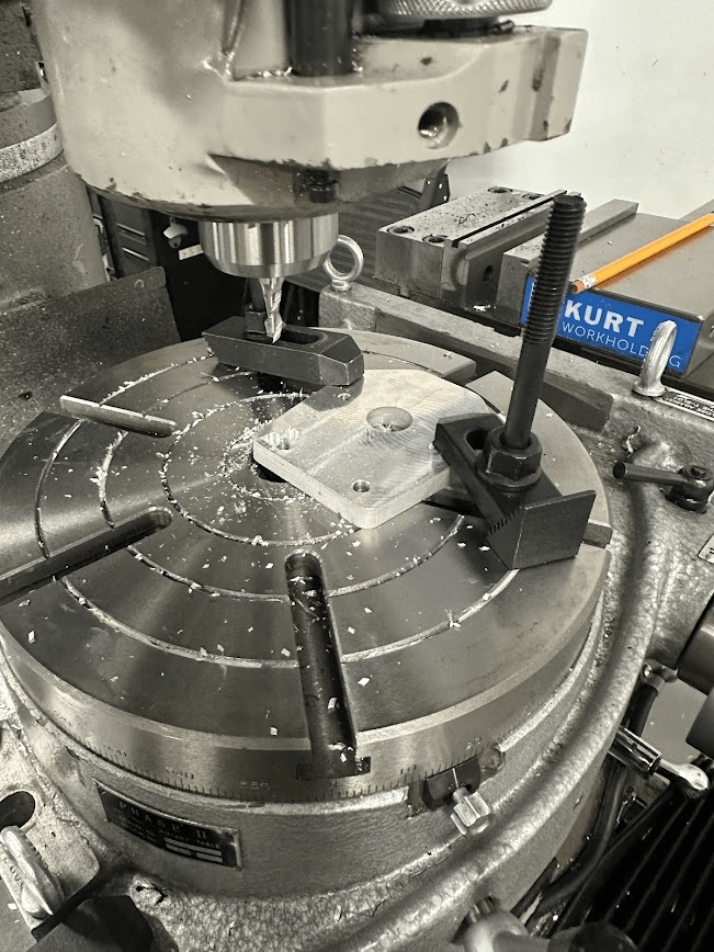 machining a triangle slot for the bolts